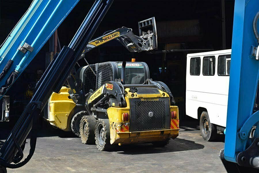 A New Holland skid steer loader at Guzent's equipment yard.